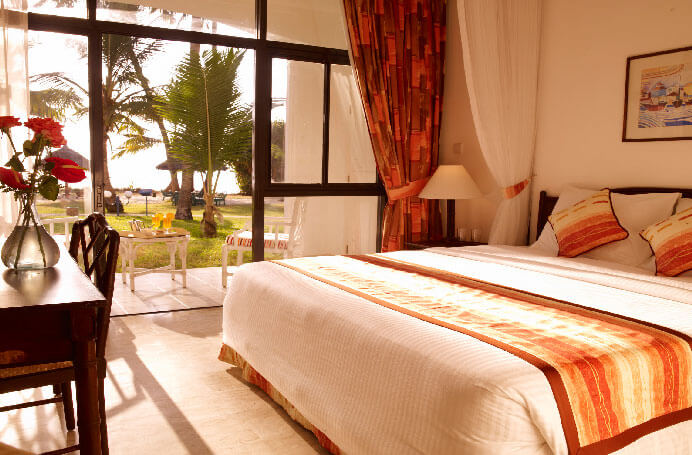 White sand beach and palm trees on Mombasa's north coast